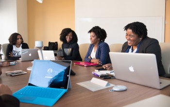 women sitting at desk